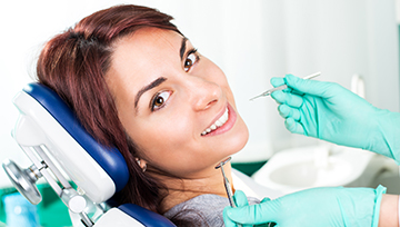 Woman in dental chair during treatment